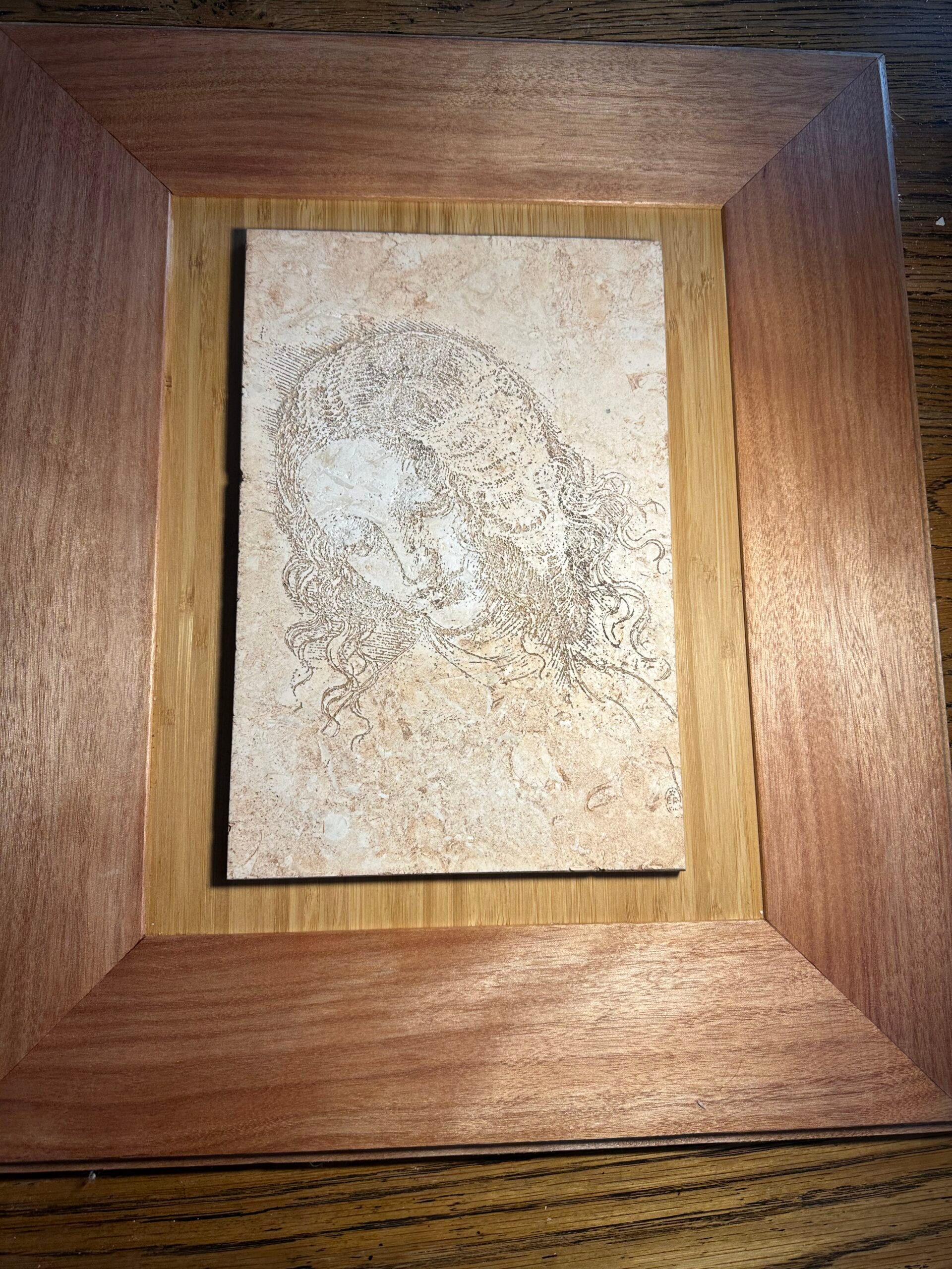La Scapigliata in Umber large 30x20x1.2cm, framed in 53.5x46cm ash mount